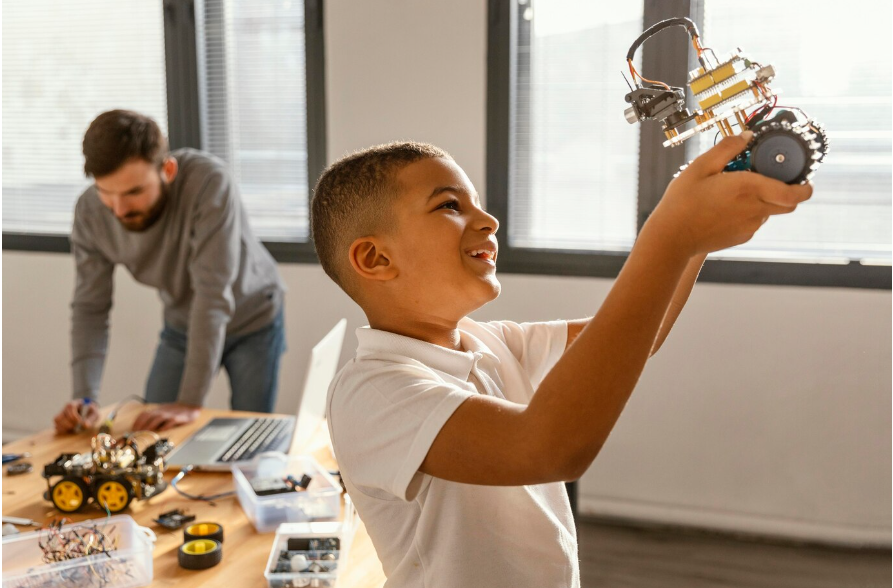 child_with_robot_in_front_of_a_window