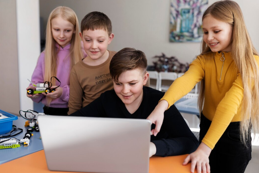 Students looking at a laptop